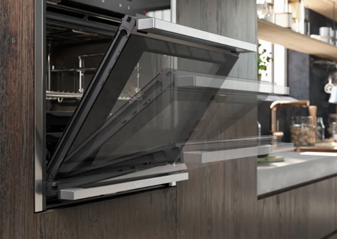 Slide and hide oven